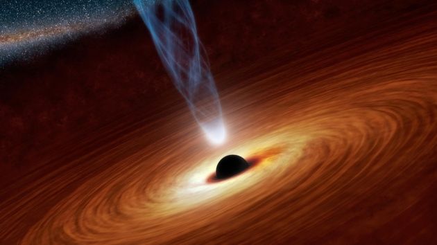 Concepção artística de um buraco negro rodeado pelo disco de acreção, estrutura composta por matéria que orbita um objeto central graças à gravidade deste. Crédito: JPL-CALTECH/NASA